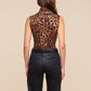 Ceci Sleeveless Leopard Turtleneck