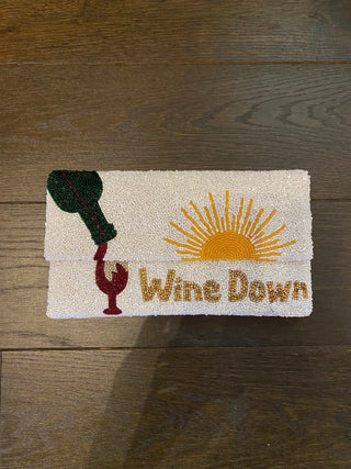 Wine Down in White with Sunset Clutch